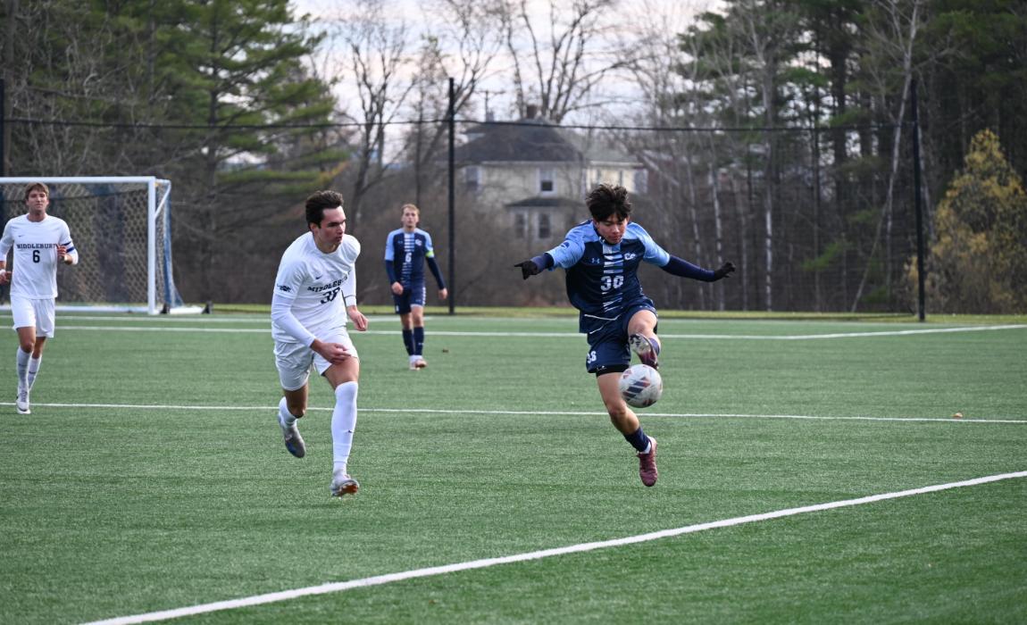 Camel player controls the ball during a soccer match against Middlebury.