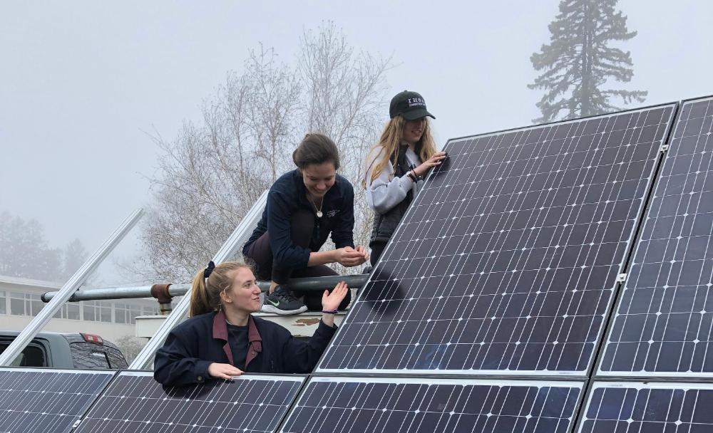 Students setting up solar array.