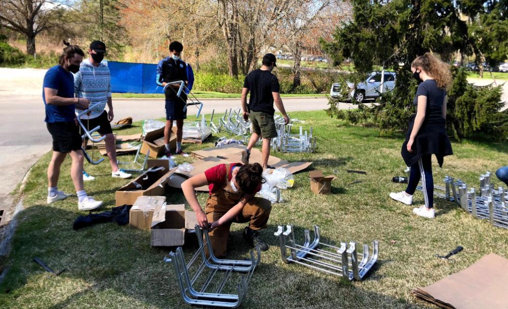 Students building racks for solar array