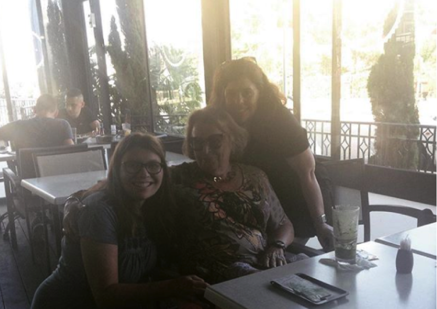 Julia poses with her Cousins Suzanne and Gabi at a restaurant in Israel. 