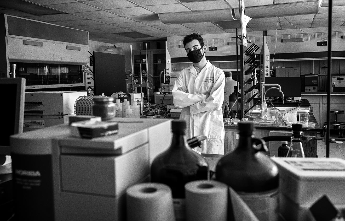 Portrait of Chris Dakopoulos ’24 in a laboratory