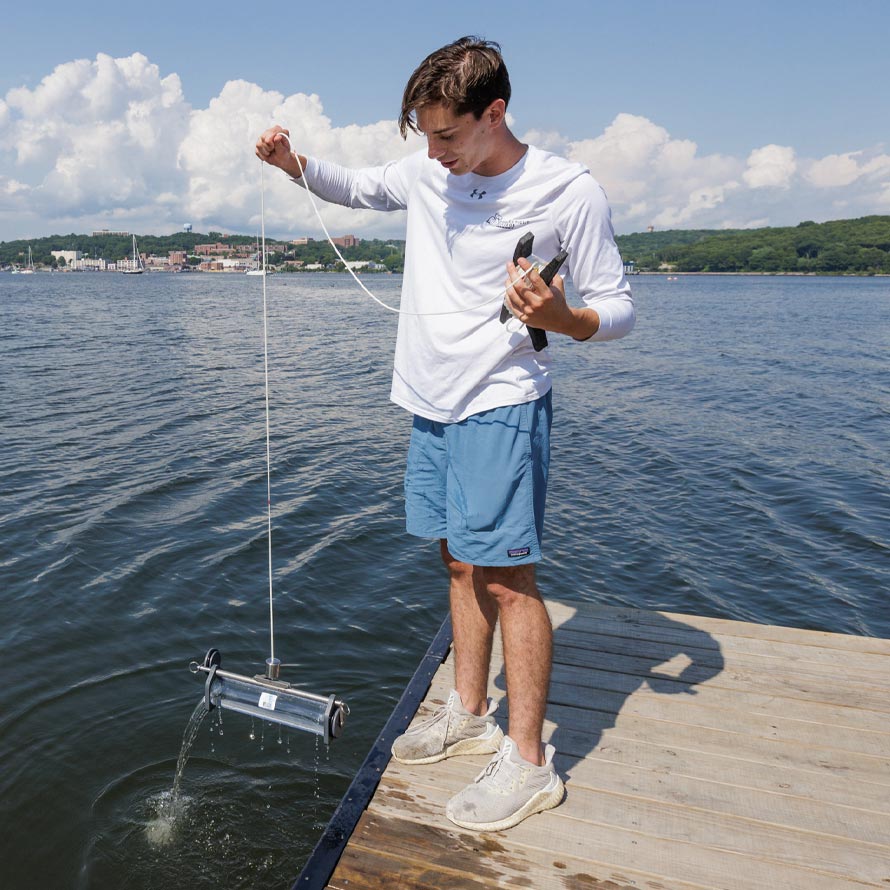 Mitchell Lockwood ’23 conducts research in the Thames River