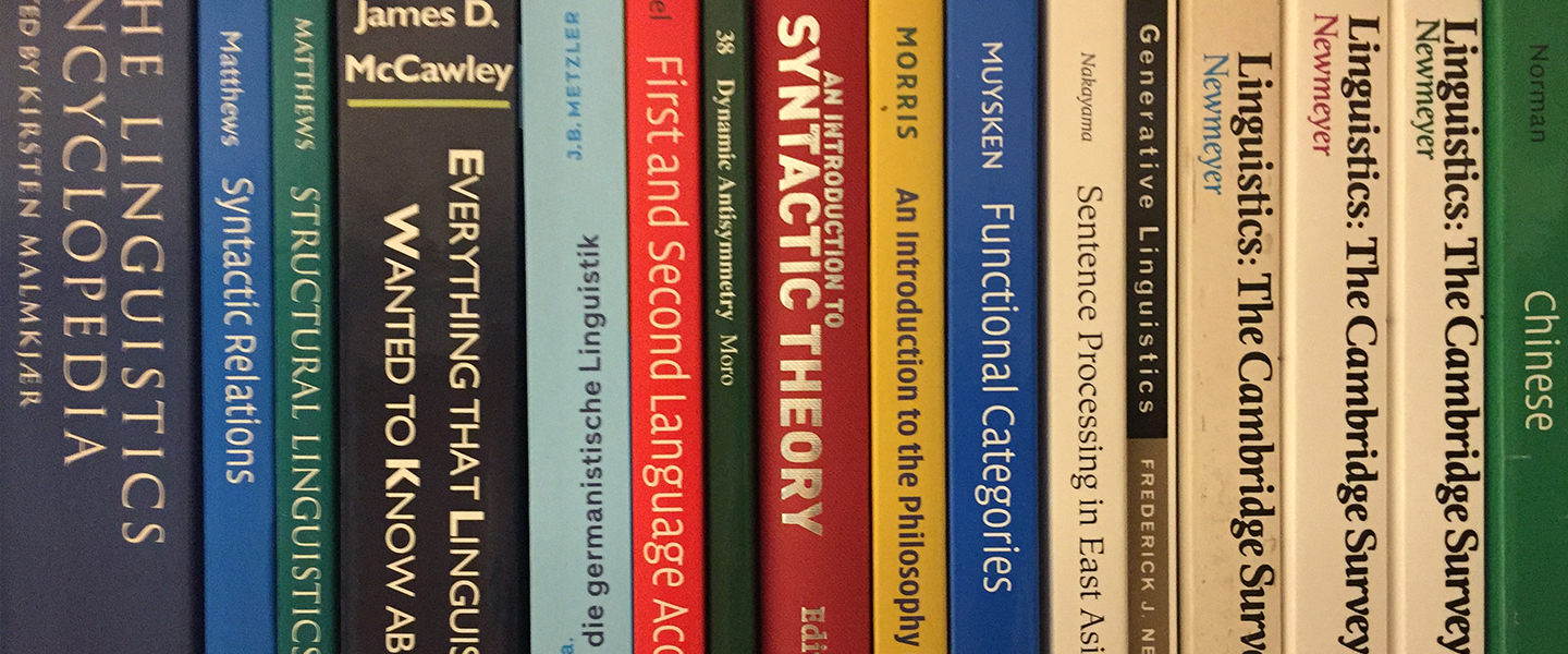 Linguistics book titles on a shelf