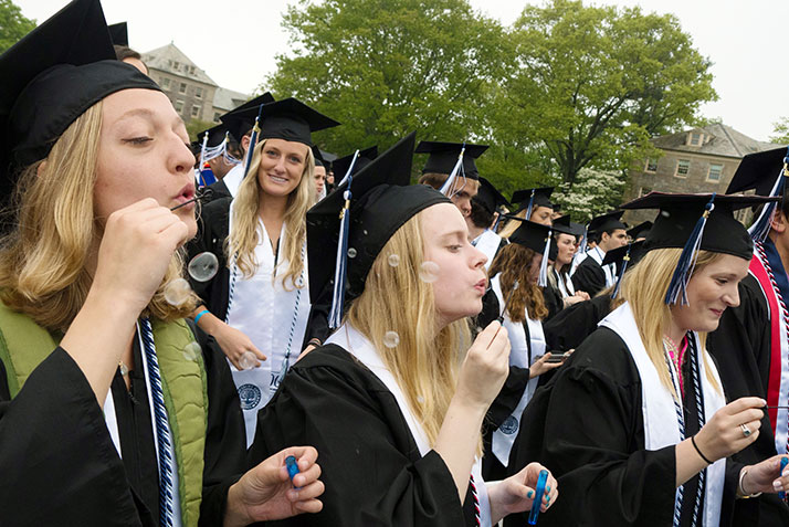Graduates blow bubbles at Commencement 2018