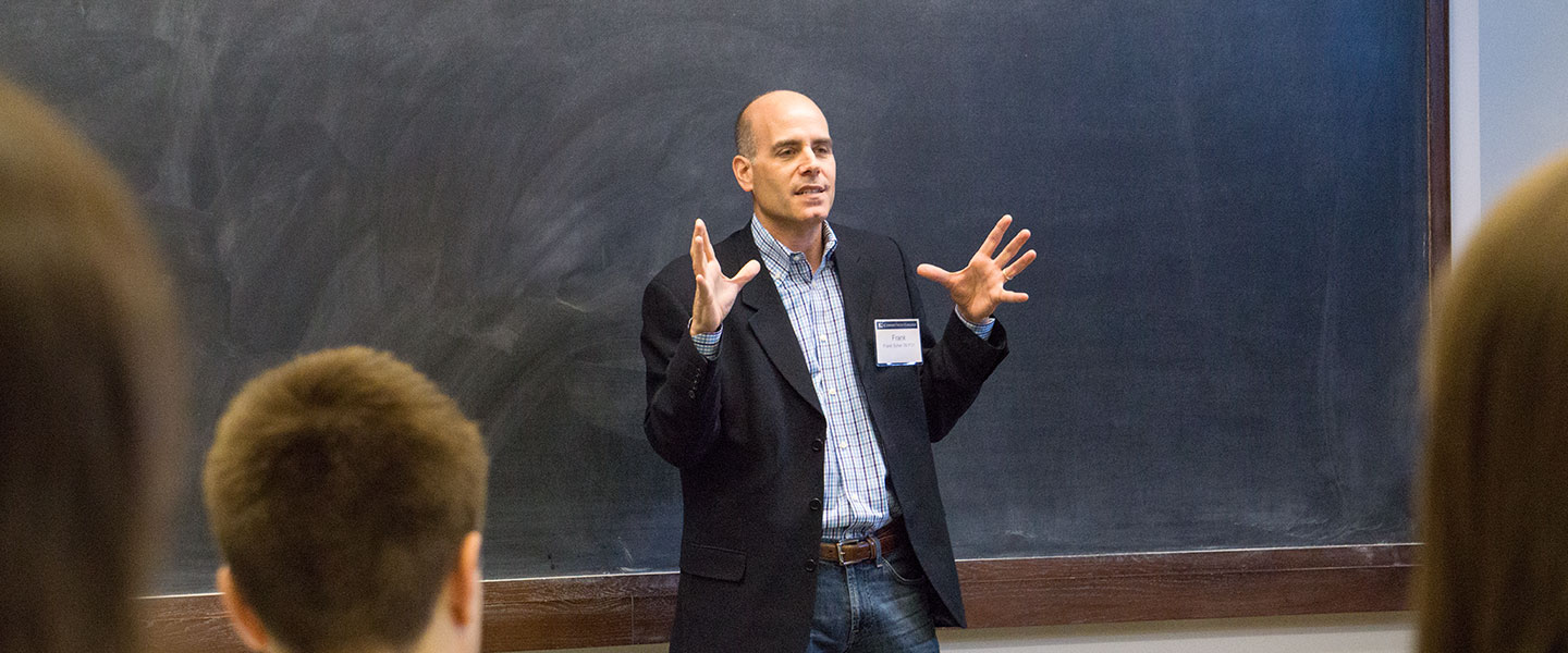 A professor talks to students during Fast Forward