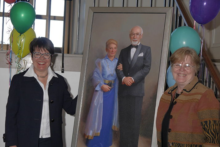 President Katherine Bergeron and Otto and Fran Walter Foundation representative Martha Peak Helman ’75 pose with the official portrait of Otto and Fran Walter. 