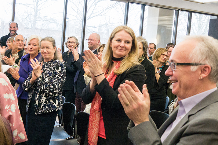 Members of the Connecticut College community cheer upon learning that the College had received a $10 grant and a $10 gift.