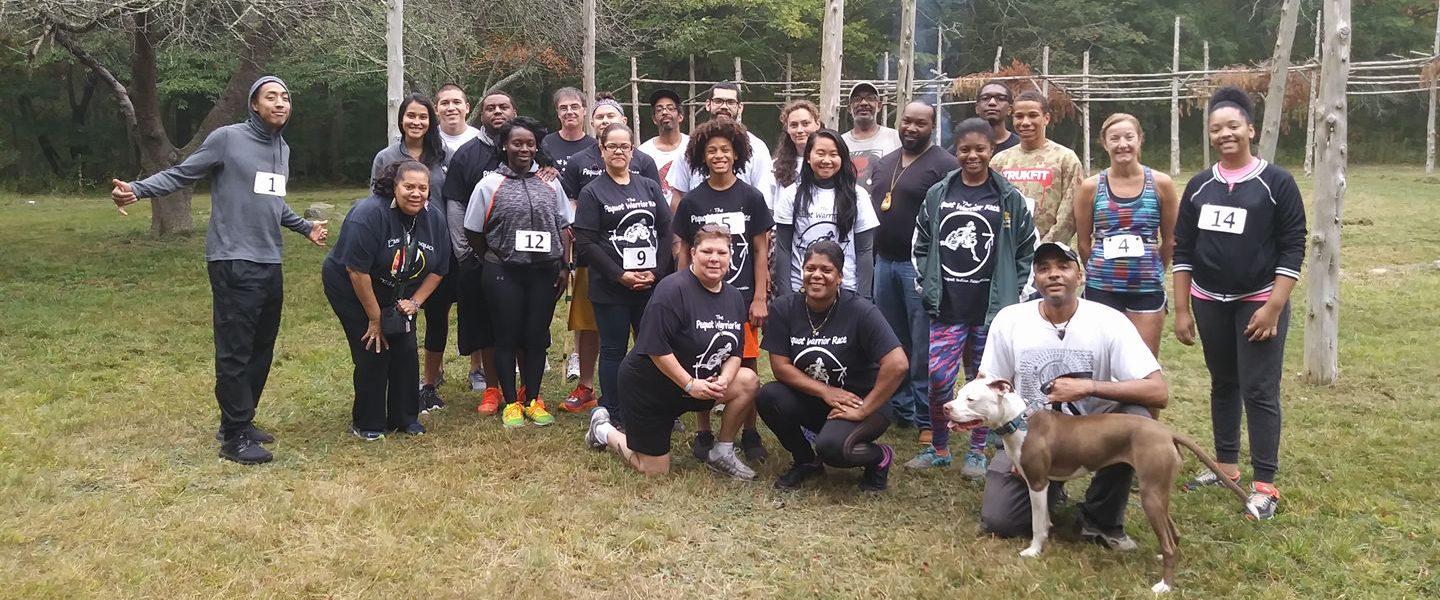 Members from the Eastern Pequot Tribal Nation, Mohegan Tribal Nation and Schaghticoke Tribal Nation pose with volunteers at the first Pequot Warrior Race in 2017 on the Eastern Pequot