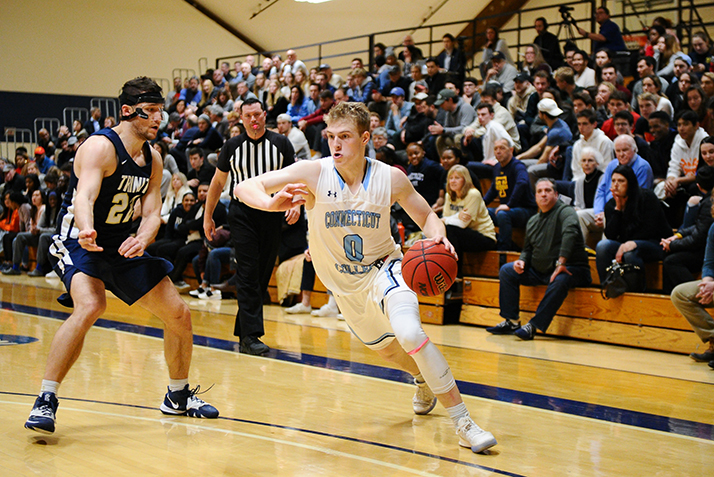 Ben McPherron ’23 possesses the ball in front of a packed crowd in Conn’s Luce Field House.