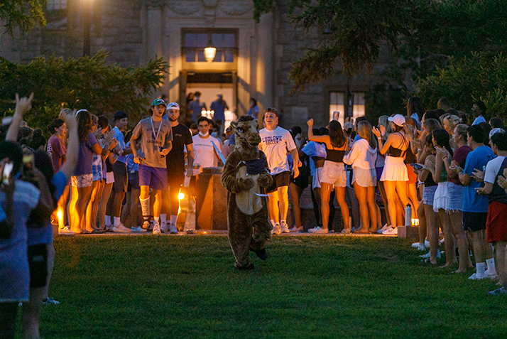 Students enjoy an evening event with the Camel mascot. 