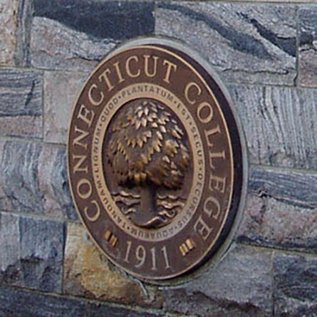 The Connecticut College seal on the entrance sign