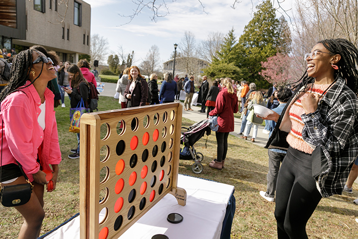 Students enjoy an oversized game of Connect 4.