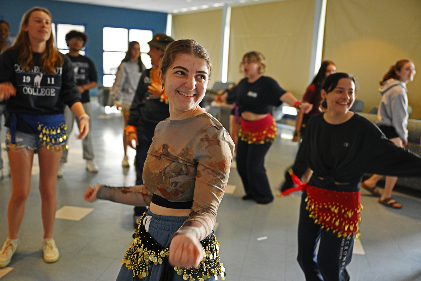 High school students belly dance during a Summer @ Conn session