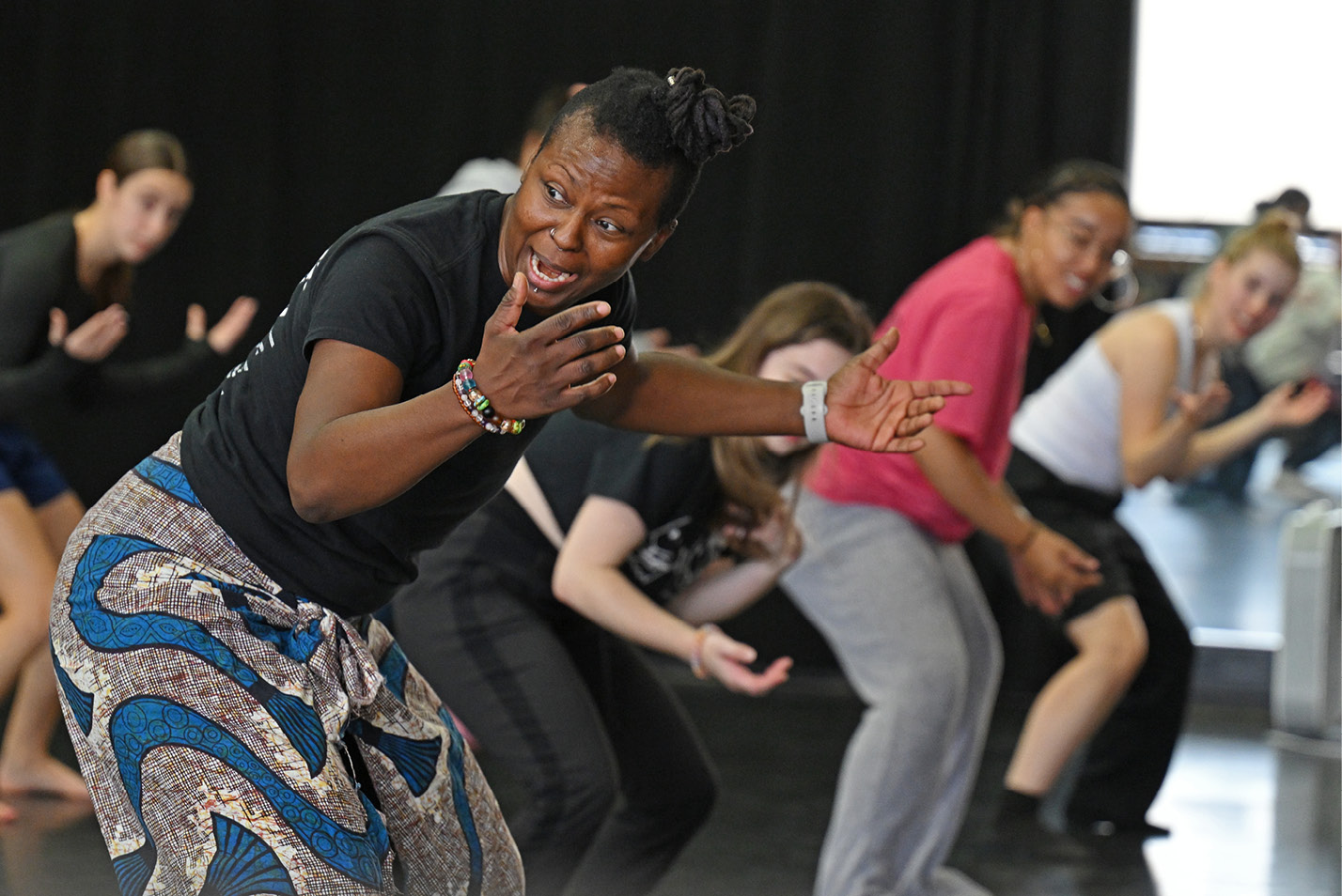 Associate professor of dance Shani Collins-Achille leads her students in her West African Dance class.