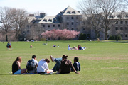Students sitting on Tempel Green.